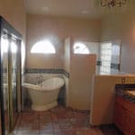 Sierra Remodeling master bathroom remodel with curved alcove bathtub
