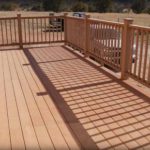 Sierra Remodeling raised deck with beautiful hand railing and post caps