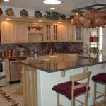 Sierra Remodeling kitchen remodel light oak cabinets, large island, granite counters and stainless steel appliances