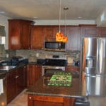 Sierra Remodeling kitchen remodel cherry cabinets stainless appliances and granite counters