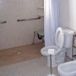 Sierra Remodeling designs and builds ADA compliant bathrooms with roll-in shower, grab bars, ADA compliant commode, bidet and sink